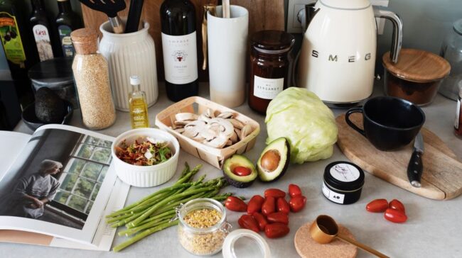 A variety of fresh ingredients and kitchen tools for preparing a healthy meal. - Photo by ready made on Pexels